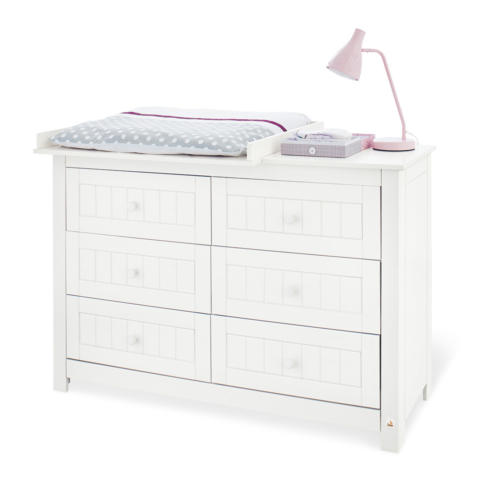 white changing unit with drawers